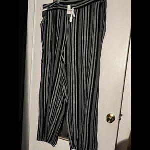 Cato’s black and white striped pants